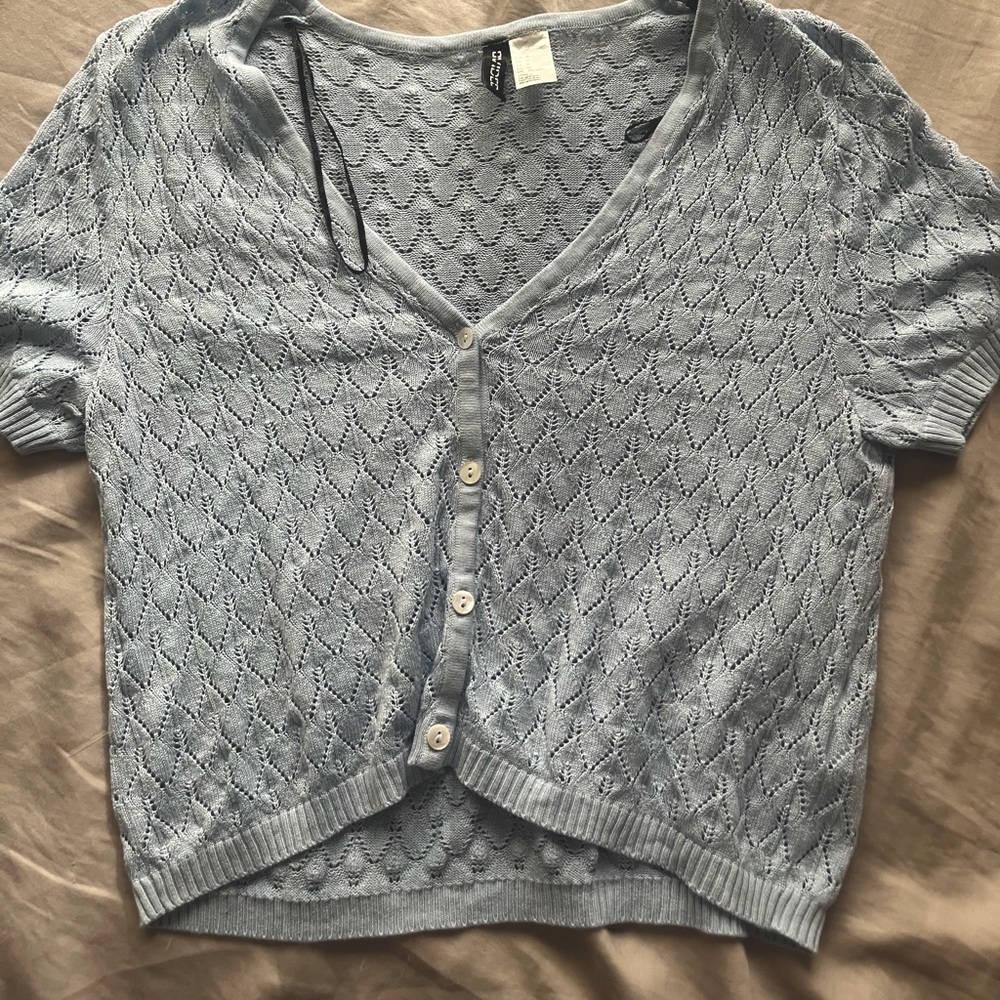Size medium blue shirt knitted see through